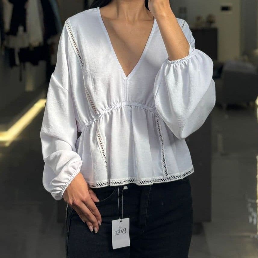 Blusa manga larga